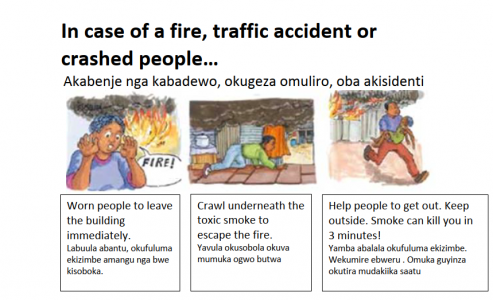 Selbstgemachte Poster informieren in der Landessprache, wie man sich bei einem Notfall verhält