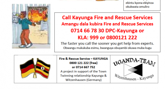 Selbstgemachte Poster informieren in der Landessprache, wie man sich bei einem Notfall verhält